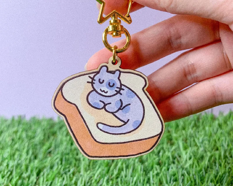 - Cat anti-jump window safety netCat Bread Bed Wooden Keychain